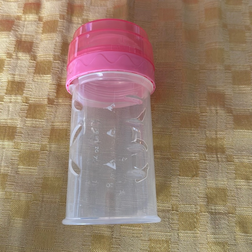 Pinkish/ reddish 4oz baby r us drop-in bottle